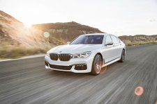 2016-BMW-750i-xDrive-front-three-quarter-in-motion-03.jpg